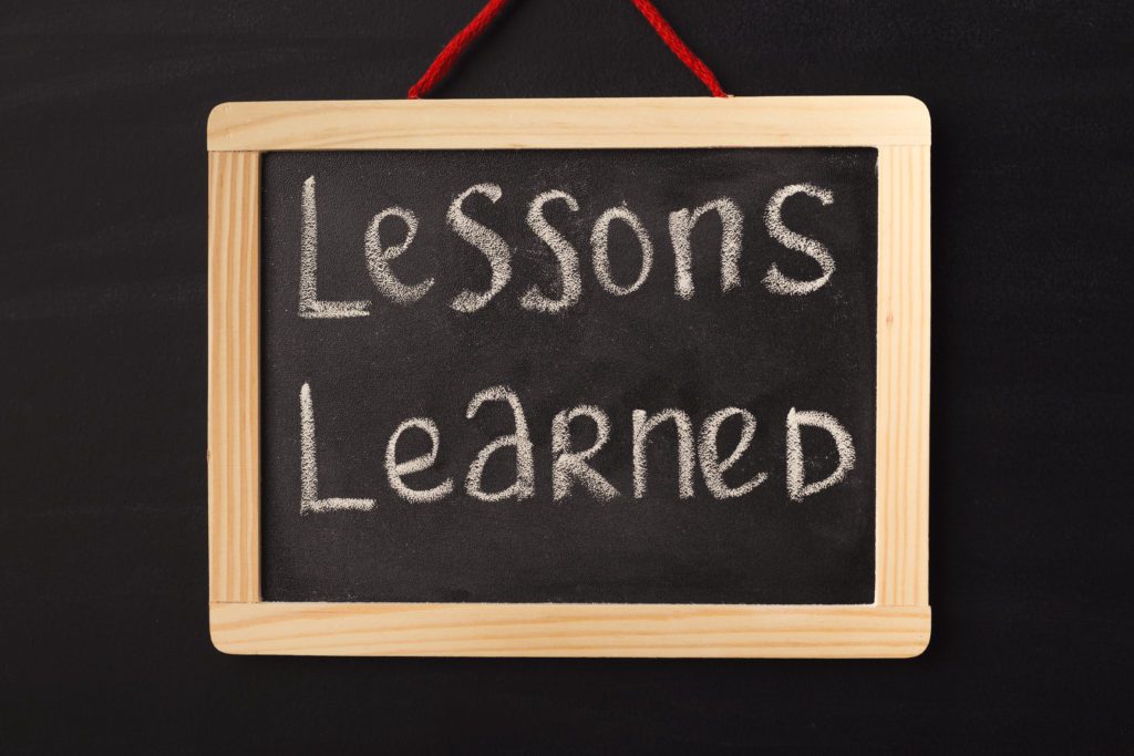 chalkboard with lessons learned written on it