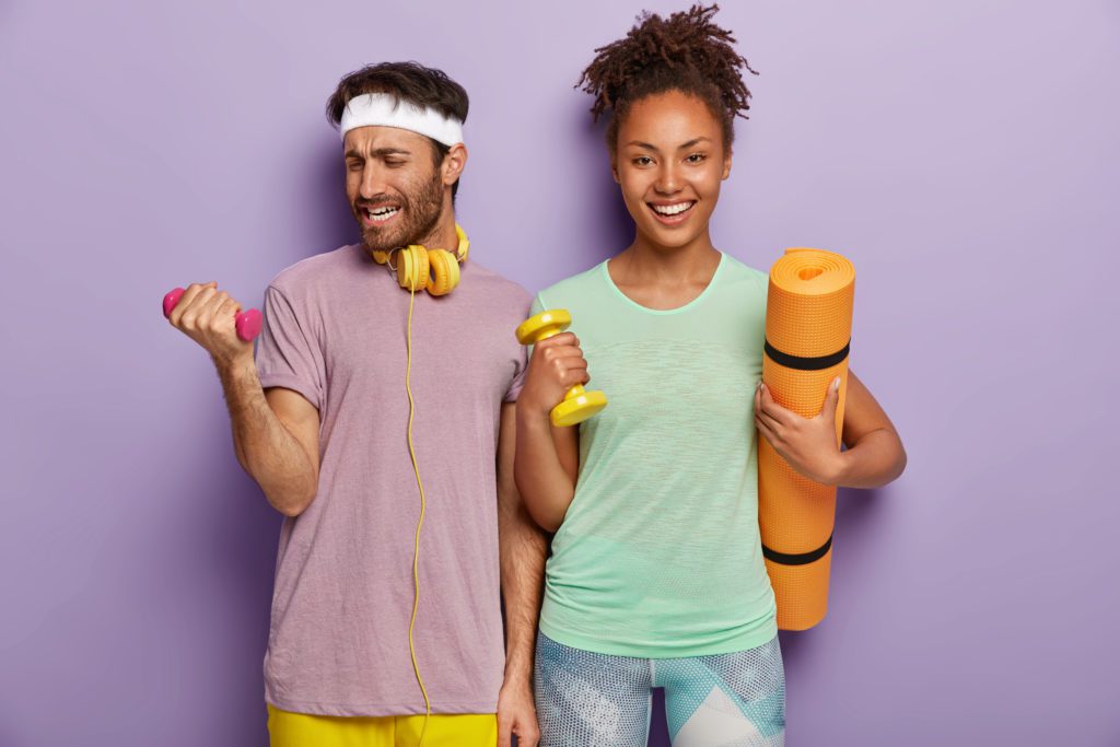 young couple with workout gear
